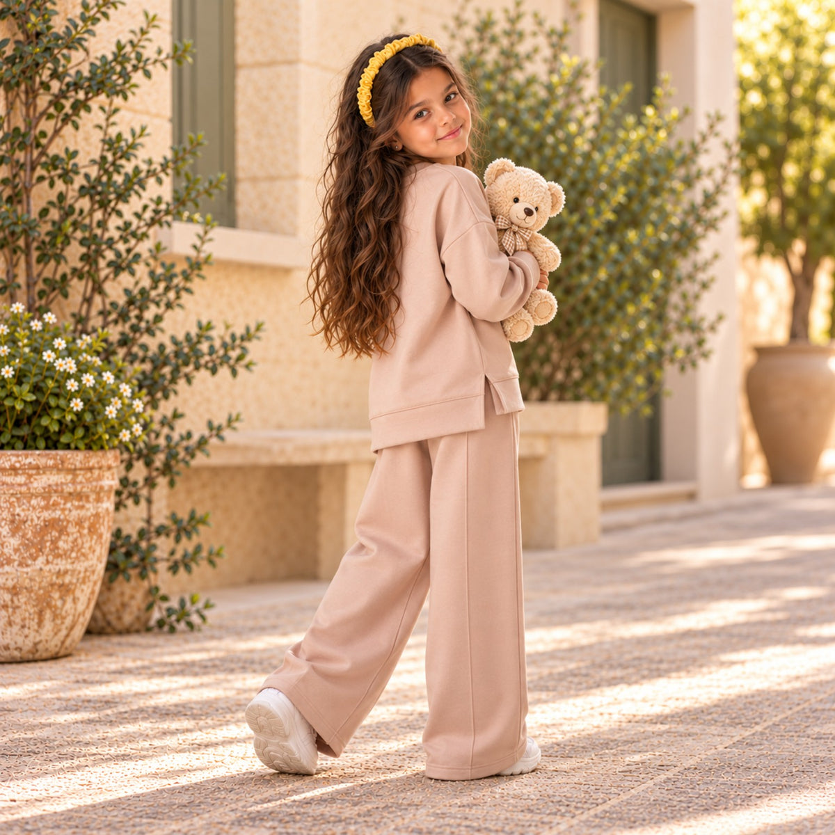 Back and side view of beige girls sweatshirt and wide-leg pants set