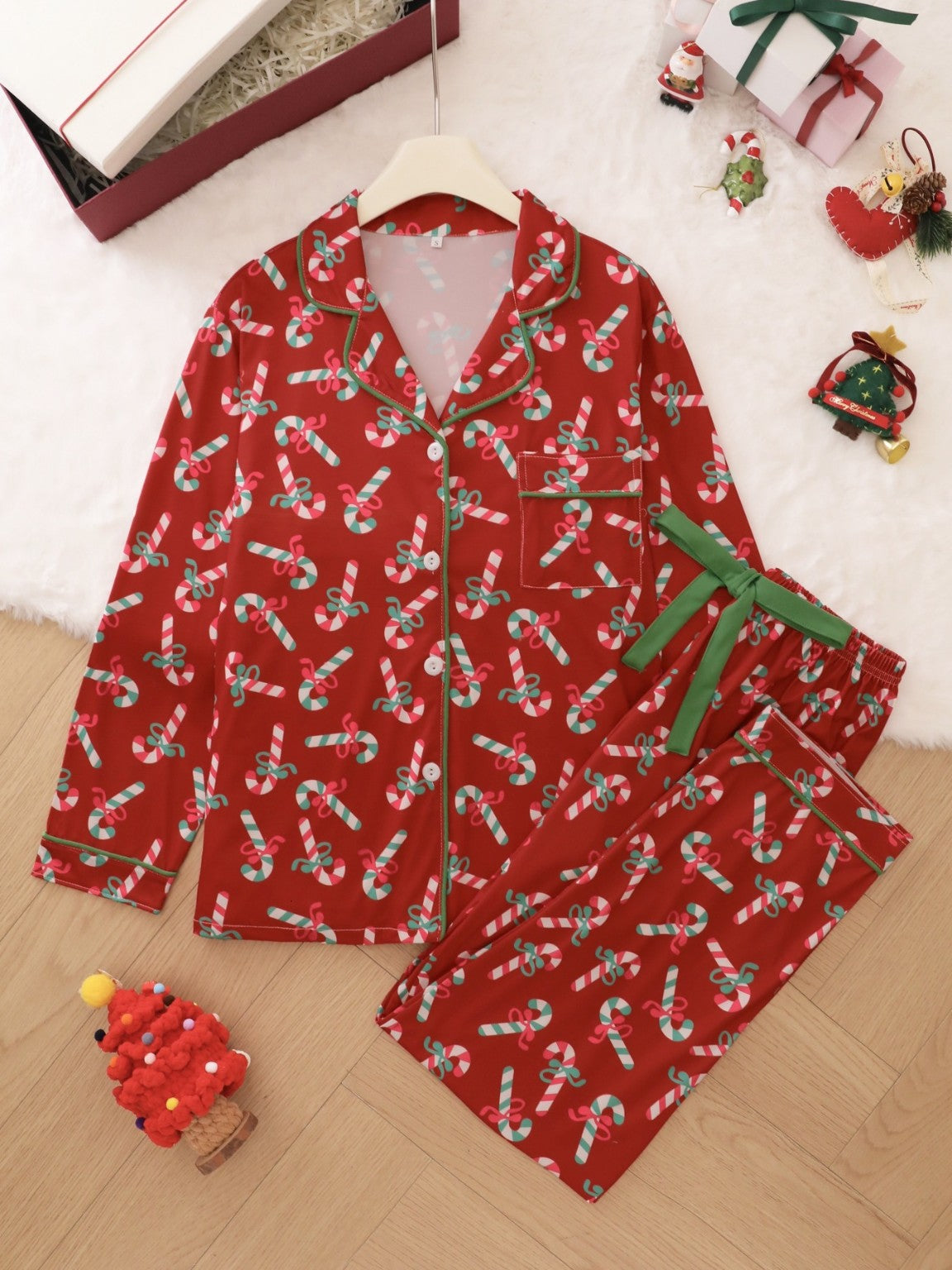Red Christmas long sleeve shirt and long pants pajama flat lay