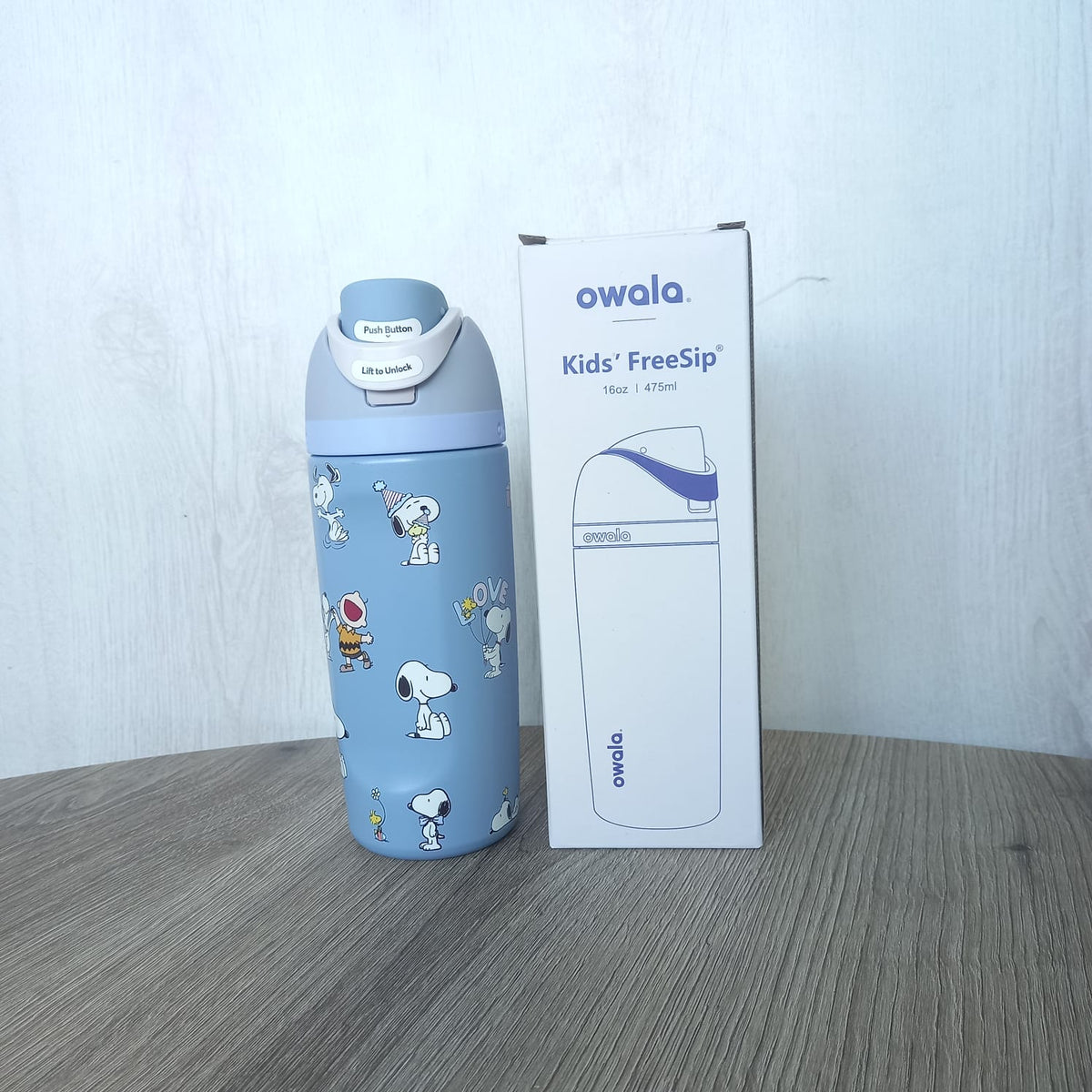 Blue Snoopy 480ml insulated water bottle alongside packaging