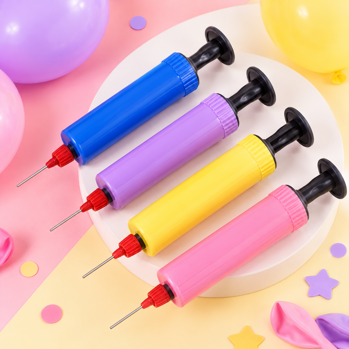Manual balloon pumps available in yellow pink and purple; blue shown for illustration