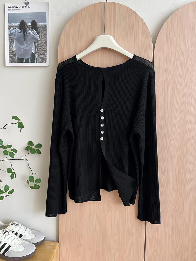 Black ribbed lightweight button-front cardigan size XL displayed on a hanger in boutique