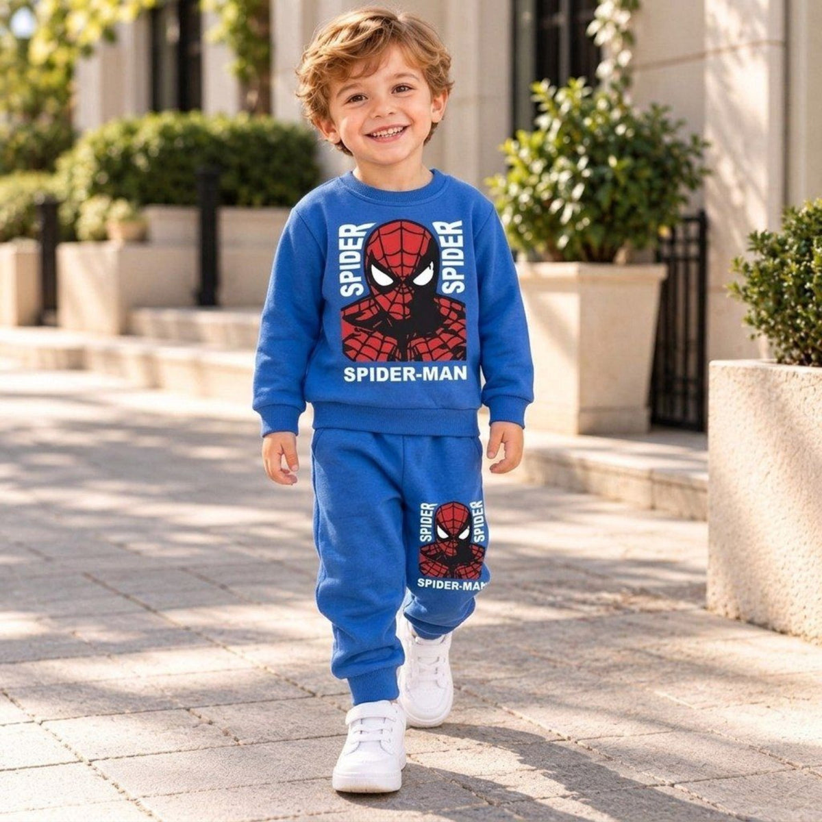 Boy wearing a blue Spider-Man fleece sweatshirt and matching joggers, 2 to 6 years