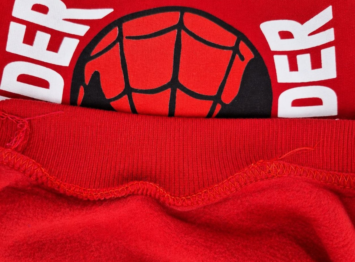 Close up showing soft fleece interior of red Spider-Man sweatshirt set
