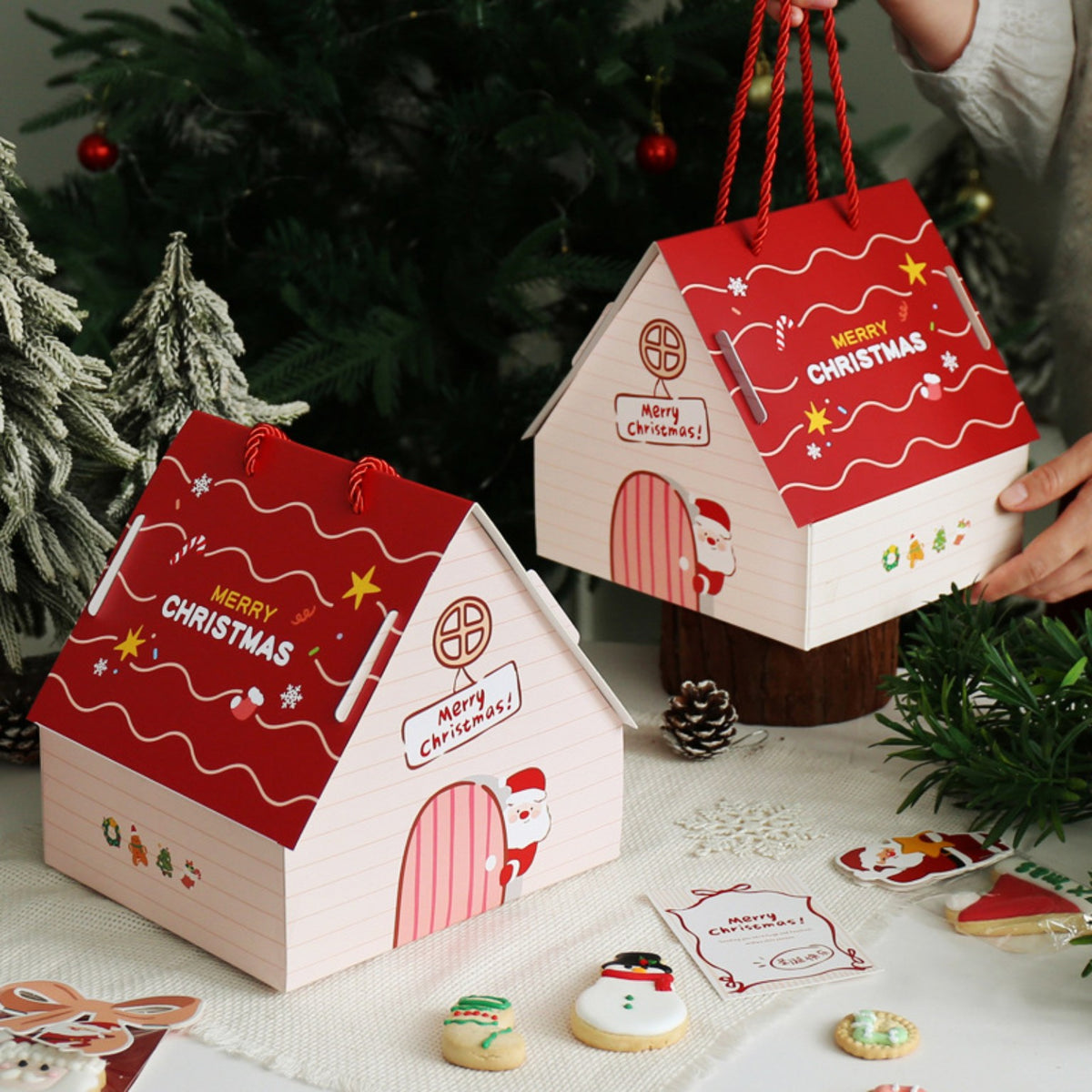 Christmas house shaped gift boxes lifestyle view
