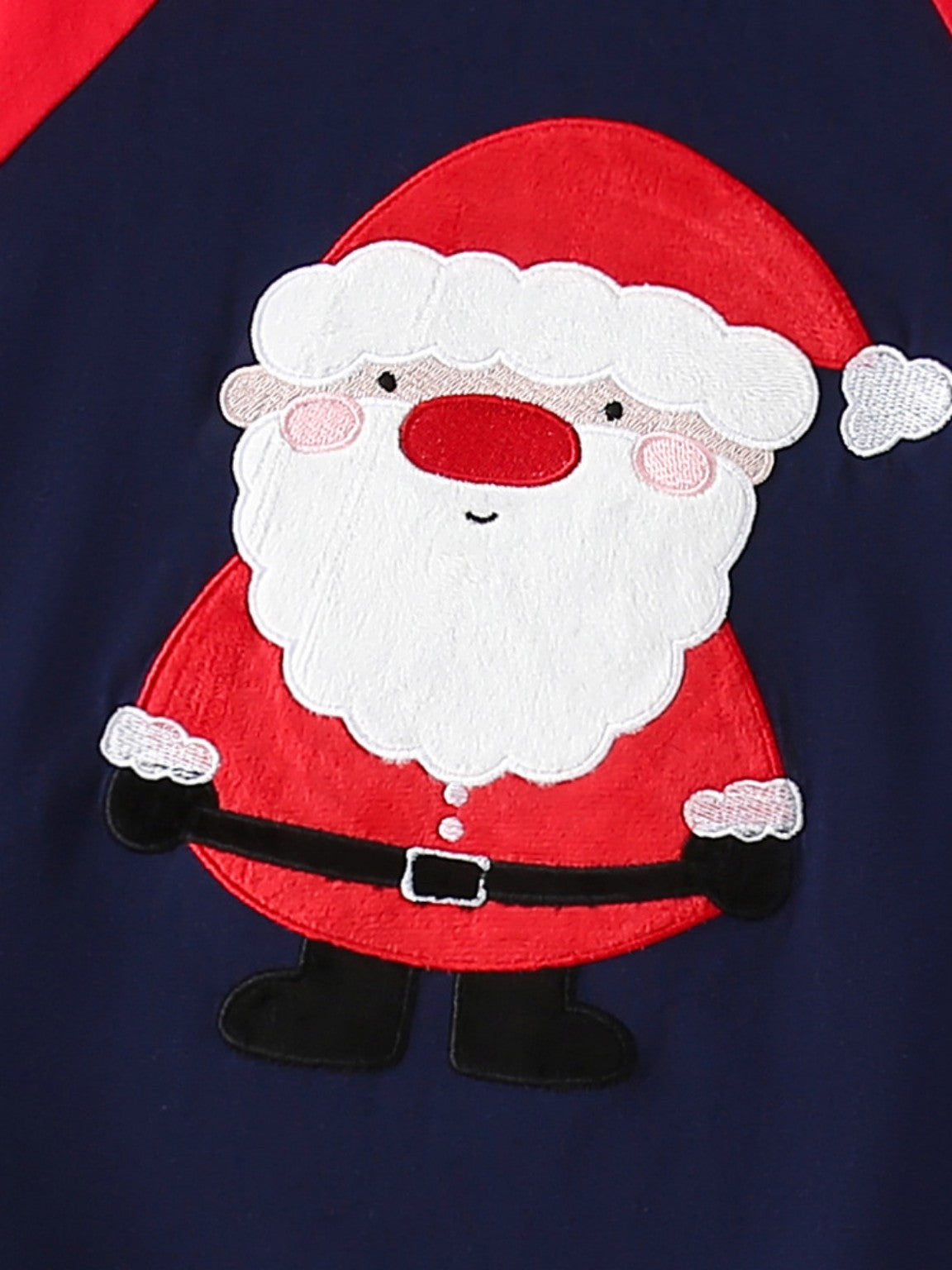Santa Claus embroidery detail on kids cotton Christmas pajama top
