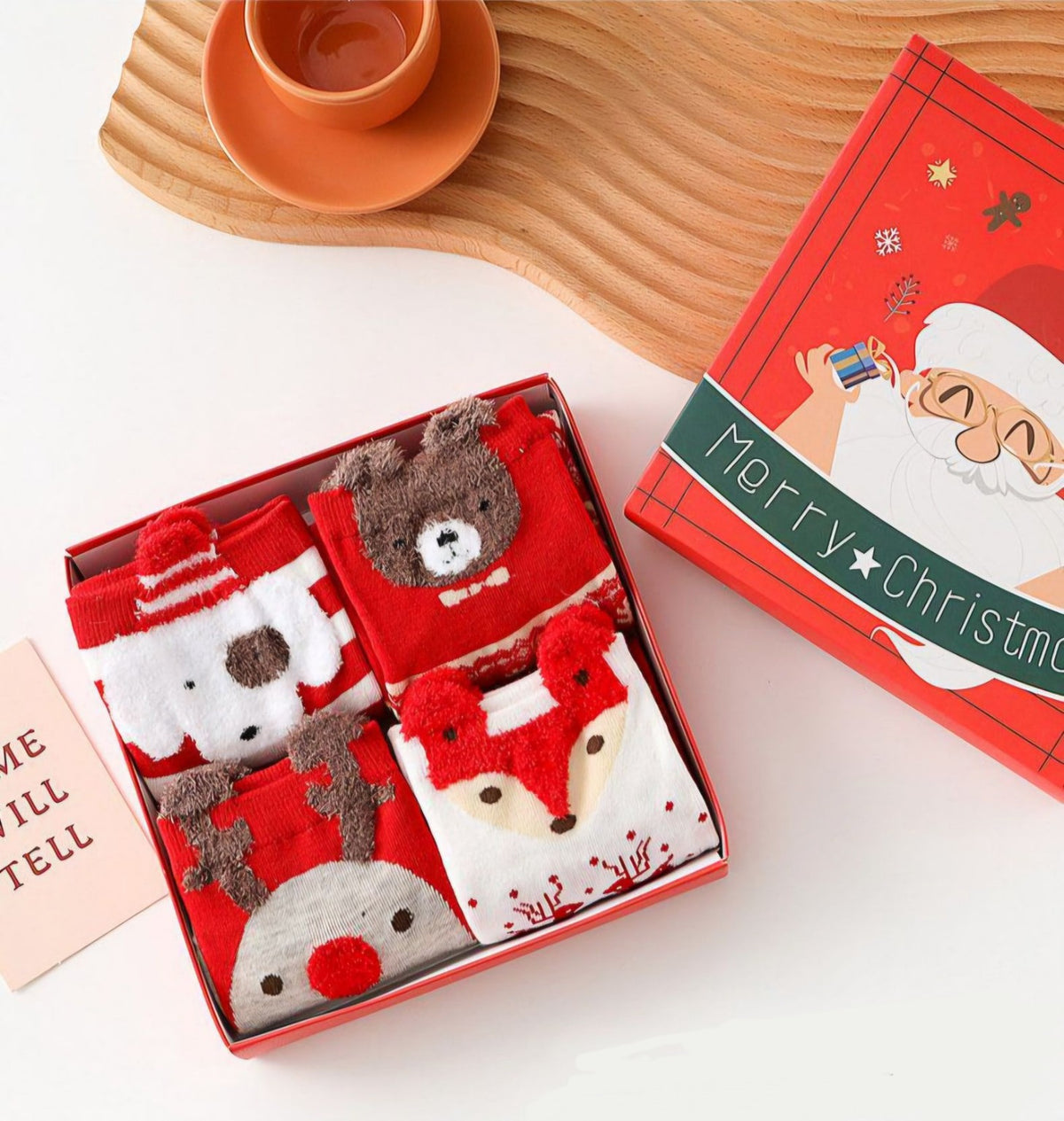 Christmas socks gift box with four festive designs