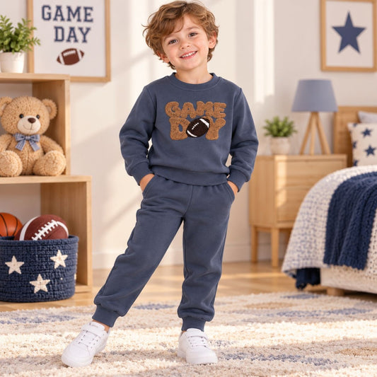 Boy modeling Game Day football navy blue warm fleece sweatshirt and joggers outfit