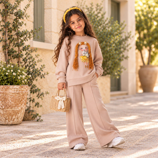 Girls beige two-piece outfit with 3D braided doll sweatshirt and wide-leg pants, front view