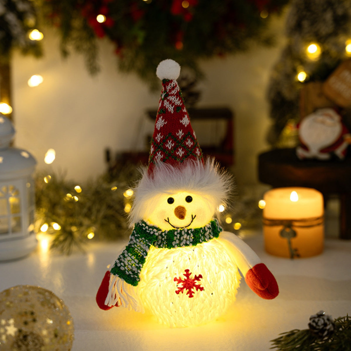 Light-up white plush Christmas snowman in red and green winter hat