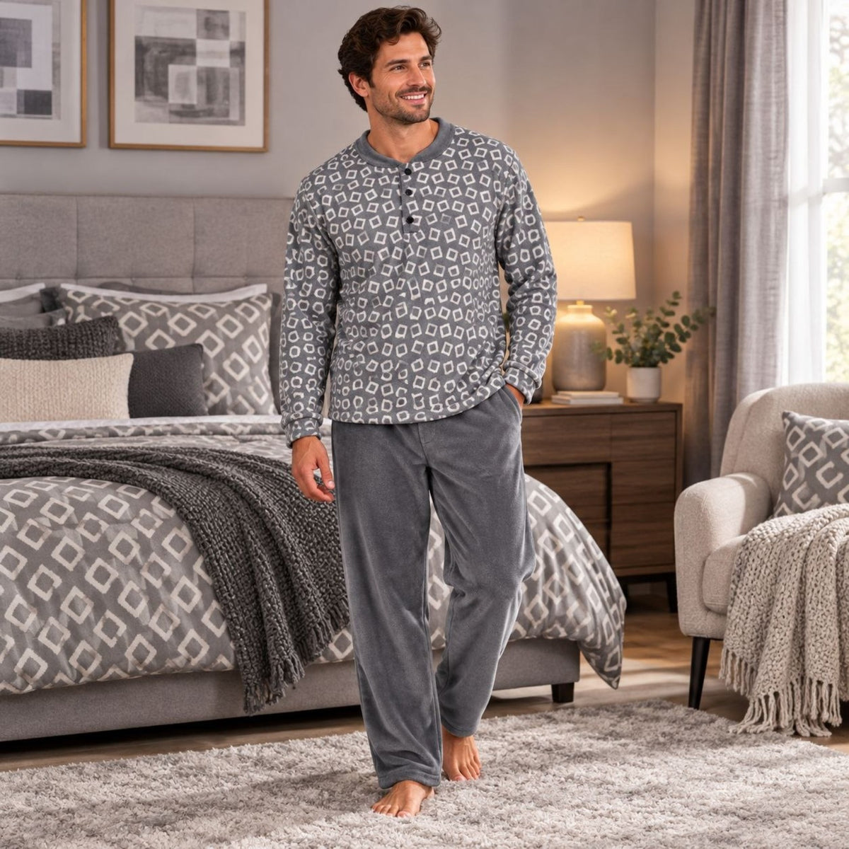 Man wearing grey geometric pattern warm winter pajamas and plain grey trousers