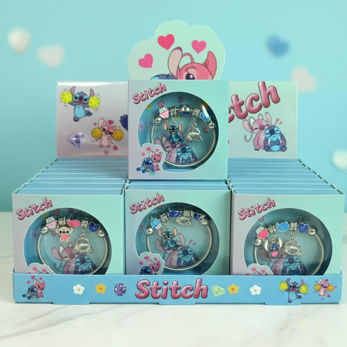 Stitch charm bracelets in pastel blue gift boxes – three assorted designs