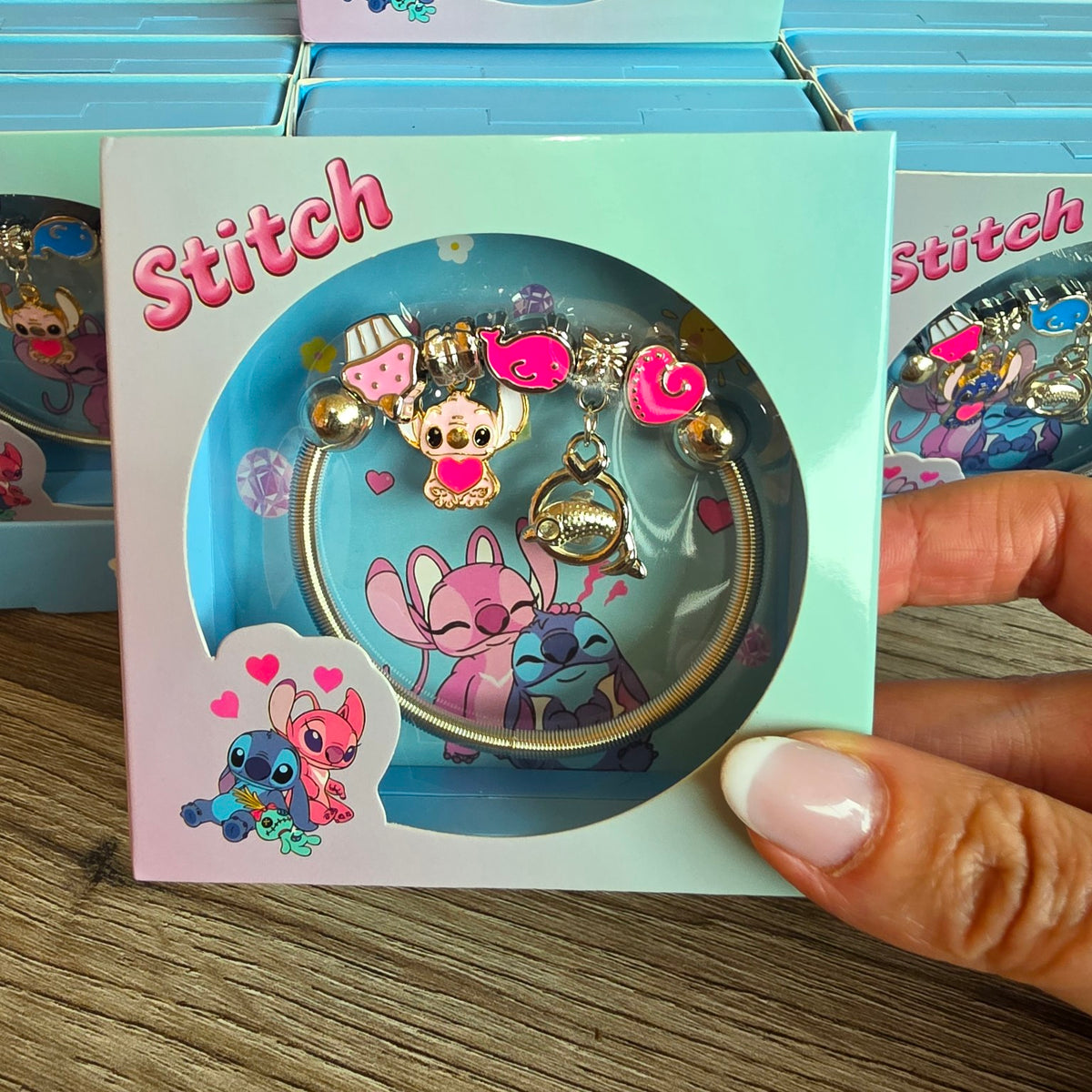 Stitch charm bracelet with pink heart decoration in gift box