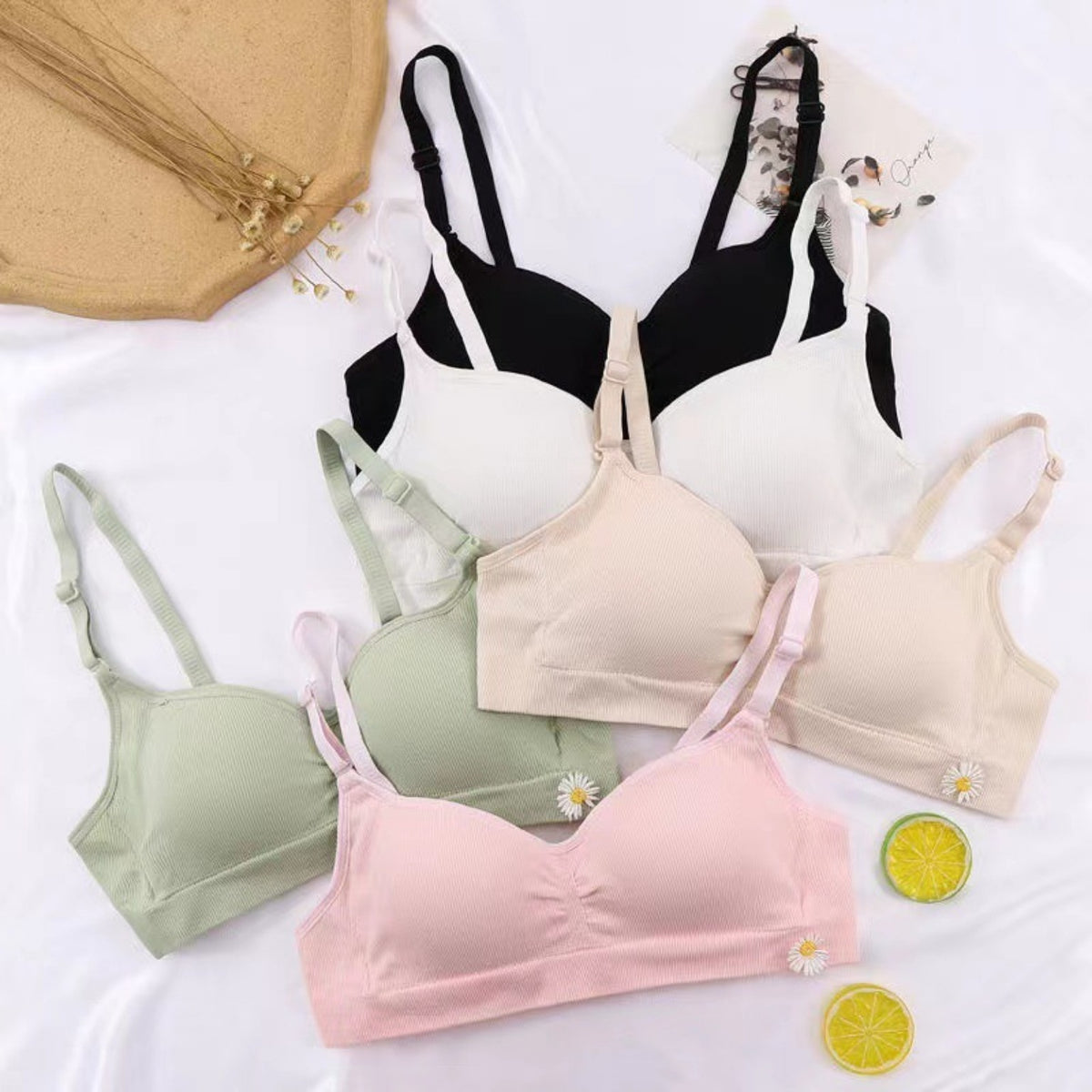Teen girls soft ribbed daisy bralettes in five available colors