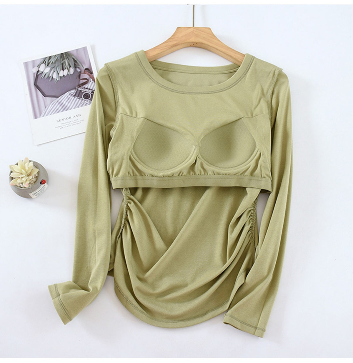 Sage green women's long-sleeve top showing built-in bra