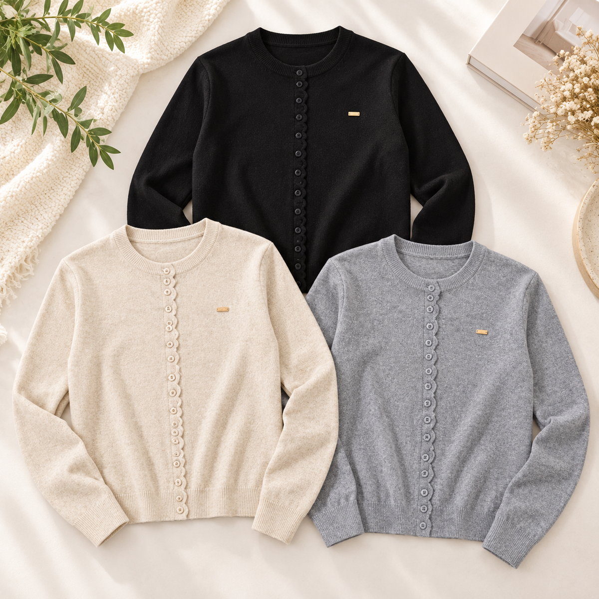 Three knit cardigans in black beige and gray
